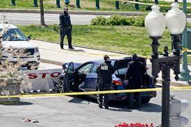 Blue car slams into barrier near Capitol.